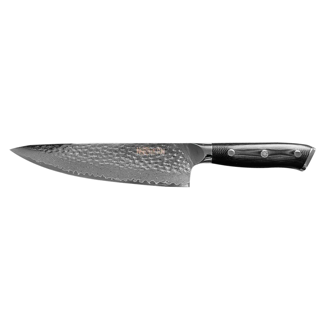 Northern Knife Odin Chef Knife on a white background featuring a 67-layer Damascus steel blade with a hammered tsuchime finish and an ergonomic black handle.